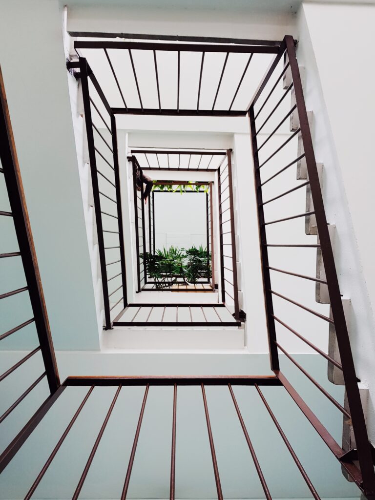 low angle view of stairwell in residential buildin 2023 11 27 04 58 18 utc